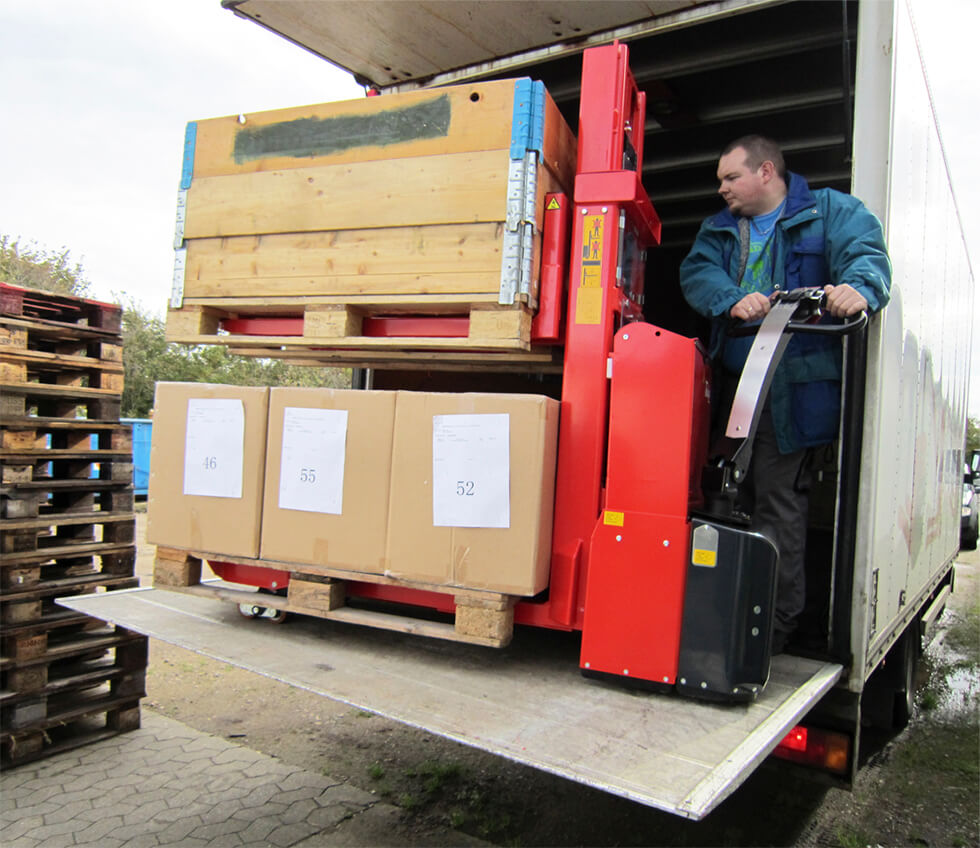 Twin Stacker driving on a lorry tail-gate